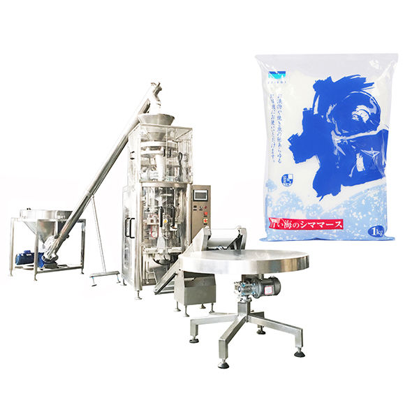 Macchina per il riempimento di forme verticali con tazza volumetrica per sale